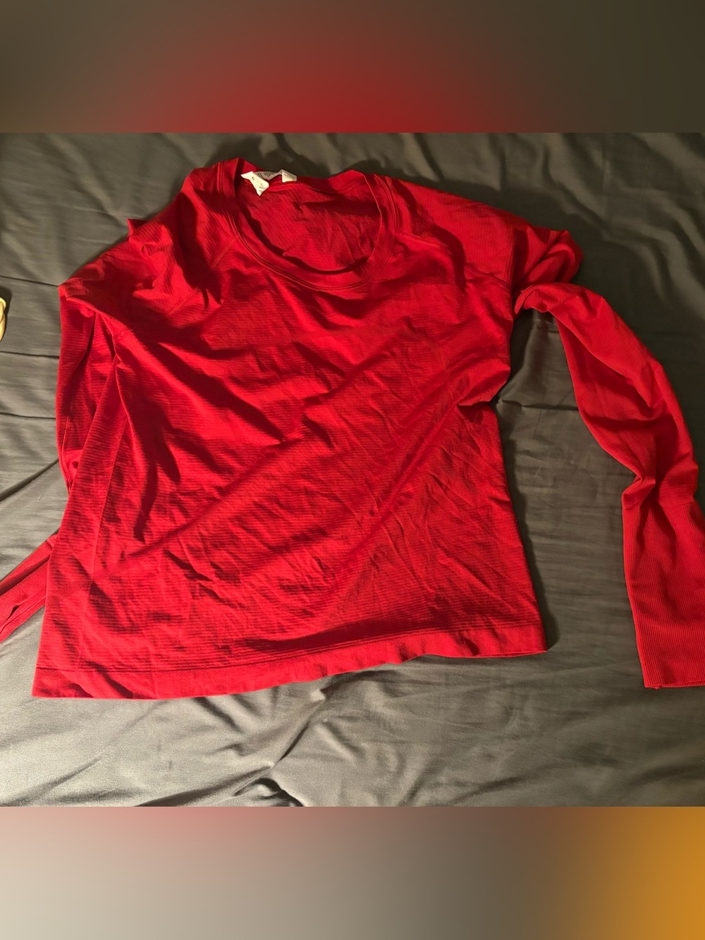 Bold red long sleeve swiftly race length